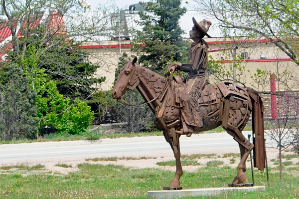 A cowboy and his horse  statue